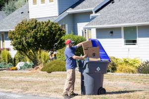 Photo provided
An Island Disposal customer fills a recycling container.