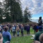 (Photo provided) Interpretive Specialist, Joy Sullivan, welcomes First Day Hike attendees at Bowman Bay on Jan. 1, 2024.