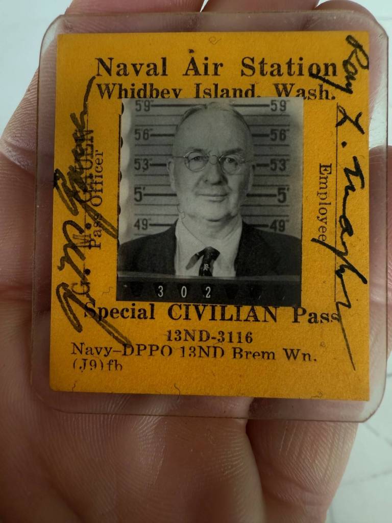 Natalie Bleifuss holds former Oak Harbor mayor and her great gradfather Ray Maylors special civilian pass to Naval Air Station Whidbey Island. (Photo provided)