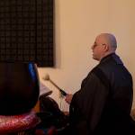 Tendo, head monk at Tahoma One Drop Zen Monastery, leads a Buddhist chant. (Photo by Sam Fletcher)