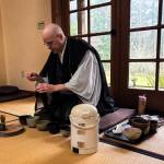 Tendo, head monk at Tahoma One Drop Zen Monastery, leads a tea ceremony. (Photo by Sam Fletcher)