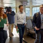 Photo by David Welton
Surrounded by staffers, members of the media and other elected representatives, Bob Ferguson boarded the ferry to Clinton Jan. 8.