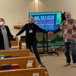 (Photo provided)
Participants of a previous Blessed are the Peacemakers event join hands and sing We Shall Overcome.