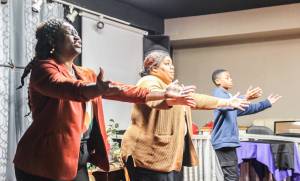 Photo by Luisa Loi
Wismine D'Avilar, Mordecai D'Avilar and Nicole Rice practice Fannie Dean's choreography for the Martin Luther King celebration.