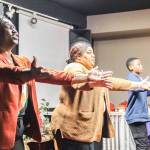 (Photo by Luisa Loi)
Wismine DAvilar, Mordecai DAvilar and Nicole Rice practice Fannie Deans choreography for the Martin Luther King celebration.