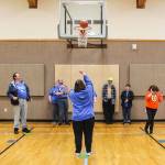(Photo by Luisa Loi)
Dagny Schellenberg shoots the ball as her teammates and coaches watch. On Feb. 8, Team Whidbey won bronze medals at the regional competition in Marysville, which has seen the participation of teams from the Cascade region  like South Whidbey, Bellingham and Mount Vernon.