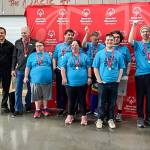 (Photo provided) South Whidbey Winds basketball team placed second at the regional competition in Marysville on Feb. 8. At left, a firefighter who handed out medals poses with Assistant Coach Rocky Hawkins, Michael Hawkins, Ryan Hagar, Mira Mostafavinassab, Greg Bailey, Conner Weaver, Nicky Whitehouse, Leo Black and Coach Mike Etzell.