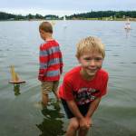 (Photo by David Welton)
Two boys play in the water at Lone Lake. The health of streams and water availability on the island were among the top concerns indicated by people who took a survey by the Whidbey Environmental Action Network.