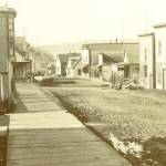 A photo from Island County Historical Museum shows Front Street in Coupeville in 1890. Many of the buildings remain today.