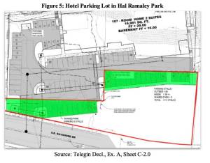 A figure in court documents shows a developers plans for a hotel in downtown Oak Harbor. The red line denotes the location of Hal Ramaley Memorial Park. The green
shaded areas show where portions of the park would be paved over to be used as part of the hotel’s parking lot.