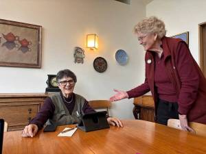 Spouses Diane Divelbess and Grethe Cammermeyer share a light moment in their home. Photo by Kate Poss