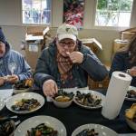 Judges try the mussel dishes before choosing the winner of the Mussel Tussle. The seven judges were selected from the audience.