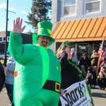 (Photo by Luisa Loi)
A friendly inflatable leprechaun paraded with Spark Movement Academy, followed by a team of acrobatic dancers.