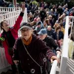 (Photo by David Welton)
An enthusiastic crowd waits to enter the newly remodeled library in Langley.