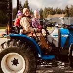 Photo provided
Jake Stewart of Sweetwater Farm on his tractor with next generation farmers.