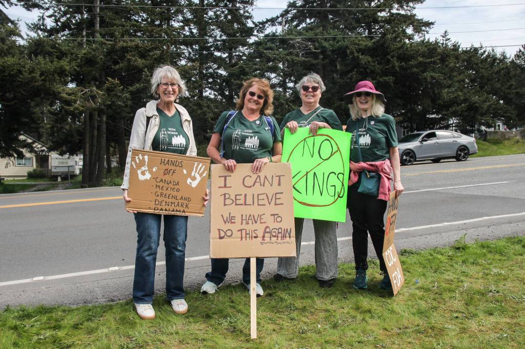(Photo by Luisa Loi)
At left, Donna Davis, Linda Flanagan Freeburg, Susan Upchurch and Karen Vojtecky were among the 1,500 people who joined the Hands Off! rally in Oak Harbor.