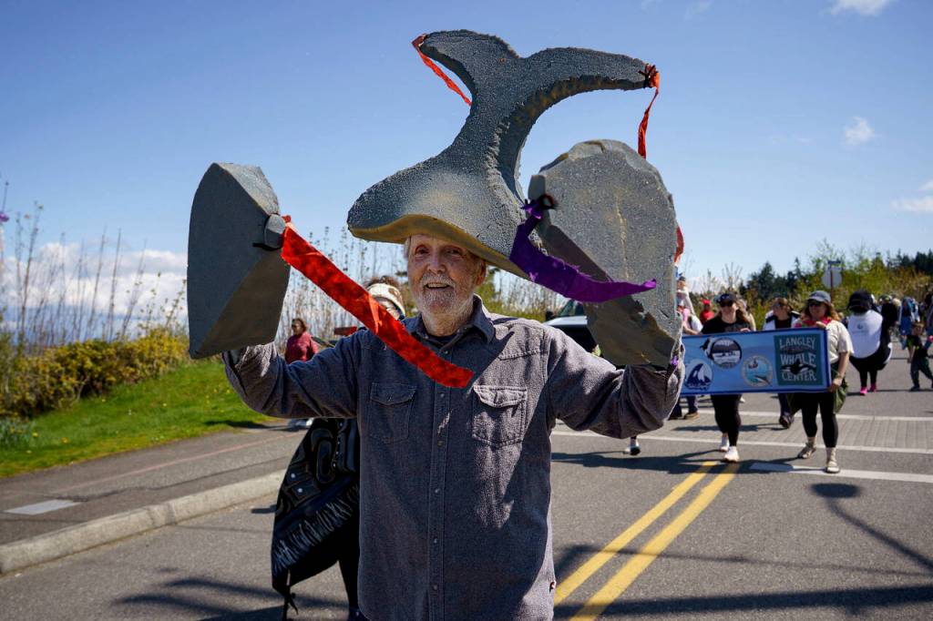 Howard Garret, co-founder of Orca Network, wore DIY whale fins and flippers. (Photo by David Welton)