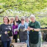 Photo by Luisa Loi
From left, Lindsey Treadwelll, Connie Bradley, Elaine Madison, Carmen McFadyen, Susan Moore, Linda Youngs stand outside the greenhouse where they have been growing almost 6,000 plants since last fall.
Photo by Luisa Loi
From left, Lindsey Treadwelll, Connie Bradley, Elaine Madison, Carmen McFadyen, Susan Moore, Linda Youngs stand outside the greenhouse where they have been growing almost 6,000 plants since last fall.