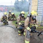 Photo by John Fisken
Firefighters and trainees got to put their skills to the test at a house offered by North Whidbey resident Kris Skrivseth.