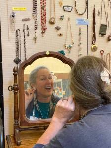 Susan Sandri checks out some bling at the sale.