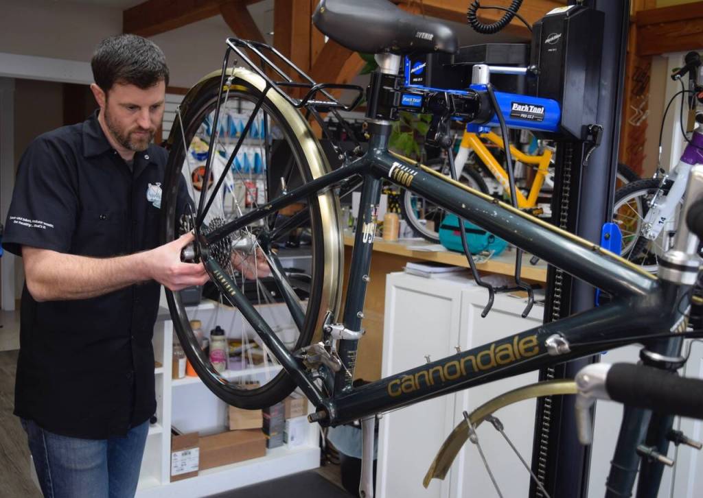 Besides buying refurbished bikes, tune ups and safety checks are on the menu at Celerity Cycles, recently opened in Coupeville. Owner Trevor Stevens designed his shop with space to teach workshops and for cyclists to fix their own bikes. Theres also coffee provided from his wifes nearby store, Whidbey Provisions. (Photo by Patricia Guthrie)