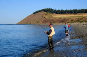 Photo by David Welton
Fishermen cast for salmon at Ebeys Landing in Central Whidbey.