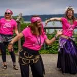 Photo by David Welton
From left, Tara Long, Debi Nordstrom and Aristana Firethorne dance May 10 as part of the Shimmy Mob.