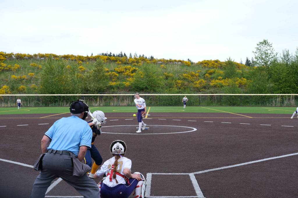 (Photo by Nathan Whalen)
Oak Harbors Reece Wasinger throws a pitch during a District 1, 3A softball tournament game against Everett May 9 at Phil Johnson Fields in Everett. The Wildcats lost 11-1 in a loser-out game. Oak Harbor finished its season with a conference record of 11-4 and an overall record of 13-8.