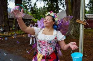 Photo by David Welton
A fairy catches a bubble during the Ren Faire last year.