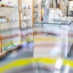 People look through shoes for sale at the Good Cheer Thrift Store. (Olivia Vanni / The Herald)