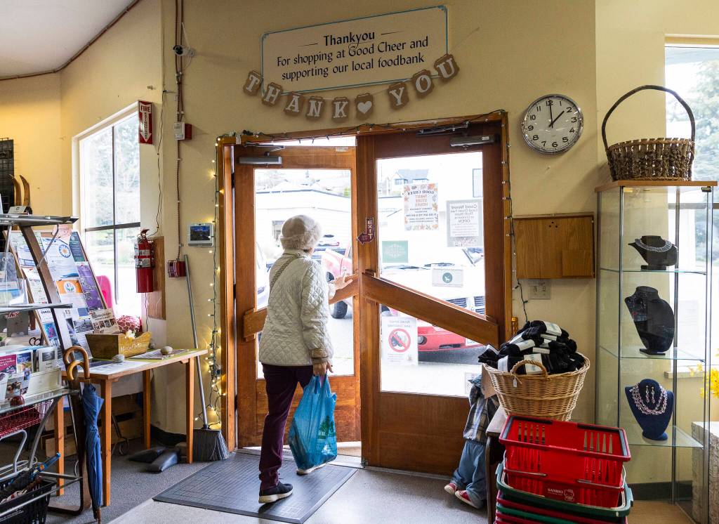A customer walks out of the Good Cheer Thrift Store in Langley. (Olivia Vanni / The Herald)