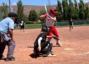(Photo by Kristi Stevens)
Chelsi Stevens digs in during the state tourney.
