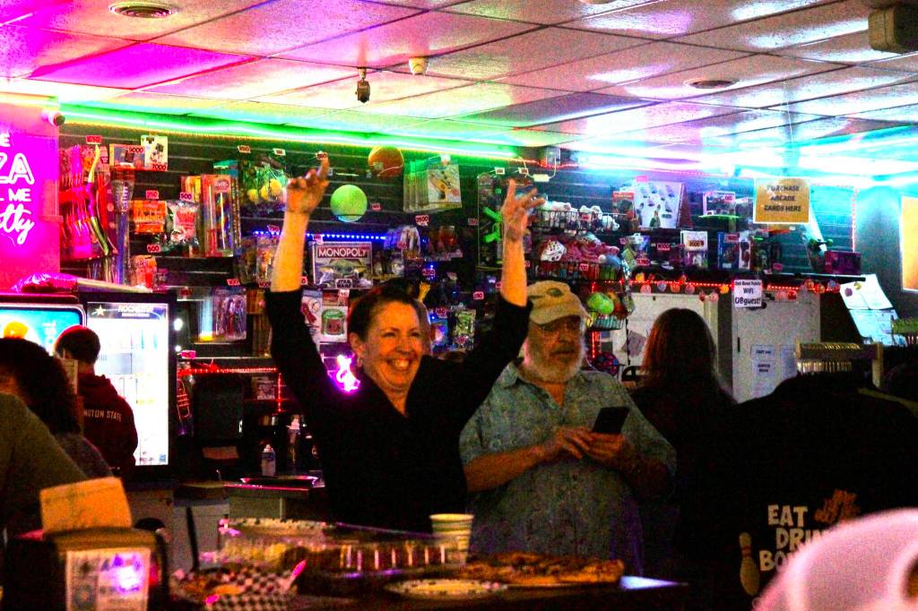 Photo by Marina Blatt
An audience member dances and cheers on the performers.