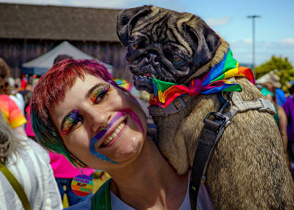 Dani Sullivan with a pug friend at the Coupeville Pride Parade, which took place a week earlier on June 14.