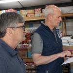 Shawn Durbin, the deputy director of North Whidbey Help House, shows U.S. Rep Rick Larsen around the food bank (Photo by Allyson Ballard)