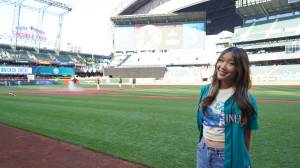 Photo provided by Danika Kloewer. 
Danika on the field ahead of her Mariners anthem debut.
