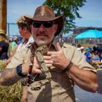 Photos by David Welton
Nathen Wilkie handles some snakes in the parade.