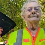 Madeline Rose takes a selfie in her road-cleanup vest (Photo provided)