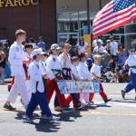 Young taekwondo practitioners march in the parade (Photo by Allyson Ballard)