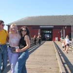 Photo by Marina Blatt
From left, Chelsea Reid, Tegan and Ellie Stewart spend a sunny day at the wharf
