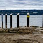 At a lower tide, the deterioration of the Possession Beach Waterfront Park boat launch becomes clearer as the warped floats twist into a perilous shape (Photo by David Welton)