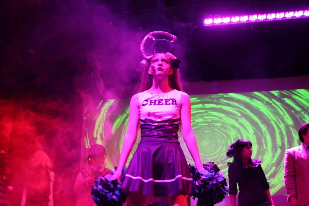 (Photo by Marina Blatt) Dead cheerleader, played by Violette Harris, sings about how she died.