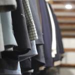 (Photo by Marina Blatt) Browse a wide range of suits at the garage sale.