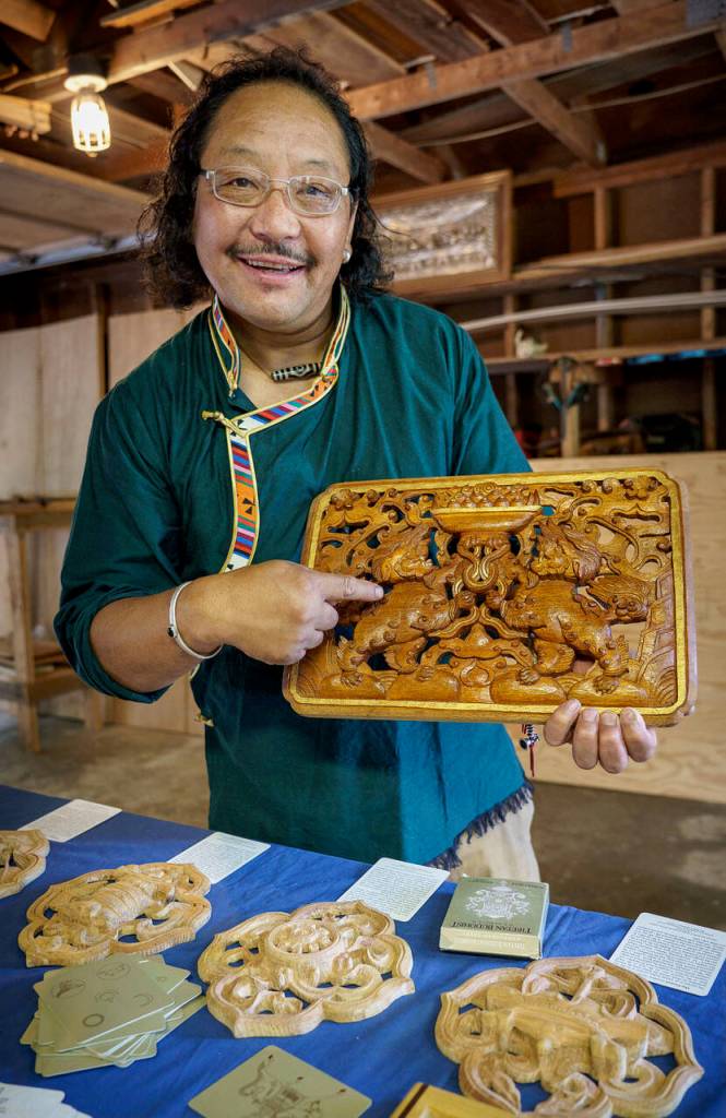 (Photo by David Welton) Some of Sampa Lhundups work includes the Eight Auspicious Signs of Buddhism.