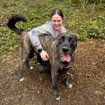 (Photo by Mary Jo Adams) Dog trainer Jackie Reid poses with a WAIF pooch.