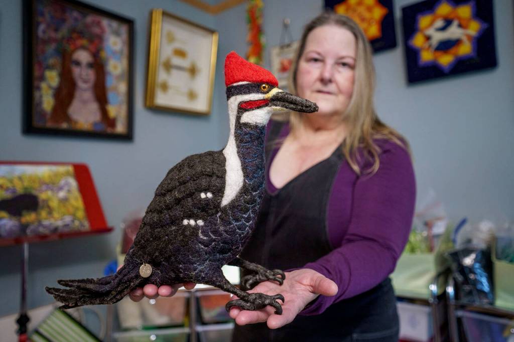 (Photo by David Welton) Gomer the pileated woodpecker, made by Coupeville felt artist Kathleen Dodge-DeHaven.