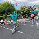 (Photo provided) Community members play with bubbles at a Freeland library event.