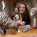 (Photo by David Welton) Lynn Swanson displays a bottle of the new Wheyfarer Vodka.