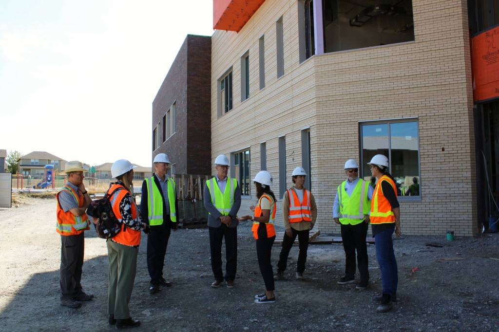 (Photo by Allyson Ballard) Wednesdays tour was U.S. Rep. Rick Larsens first time viewing the site of the new Crescent Harbor Elementary building.