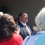 (Photo by Jessie Stensland) Hazelo greets the crowd outside the Law and Justice Center.